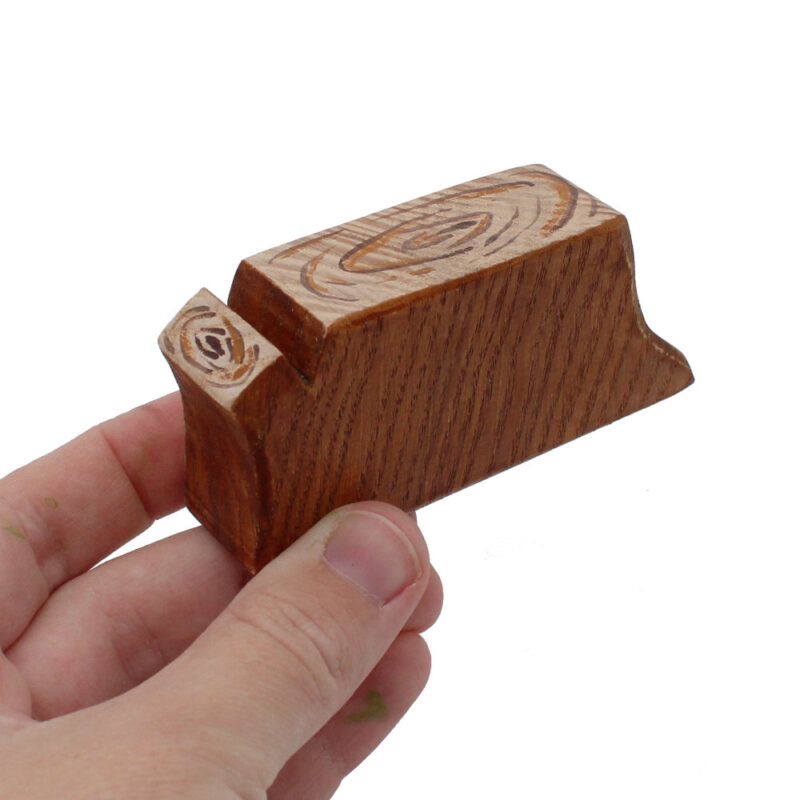 Tree Stump Wooden Figure in hand